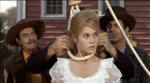 Jane Fonda gets into trouble up to her neck as Cat Ballou.